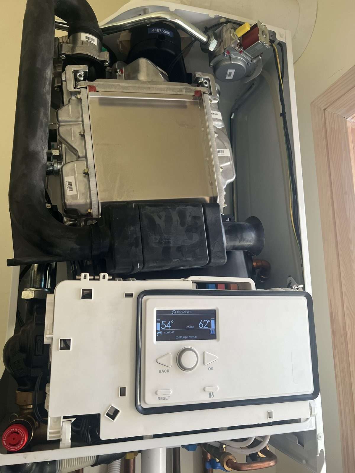 Bath Eco Heat engineer repairing a combi boiler in Bath
